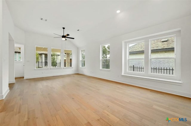 unfurnished living room featuring ceiling fan and light wood-type flooring