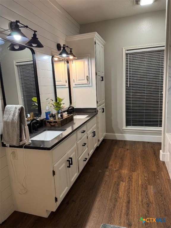 507 Hackberry Bnd, Port Lavaca, TX 77979 - full bathroom with wood finished floors and double vanity
