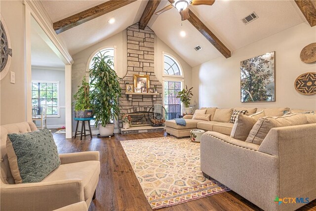507 Hackberry Bnd, Port Lavaca, TX 77979 - living area with beamed ceiling, wood finished floors, ceiling fan, a fireplace, and recessed lighting