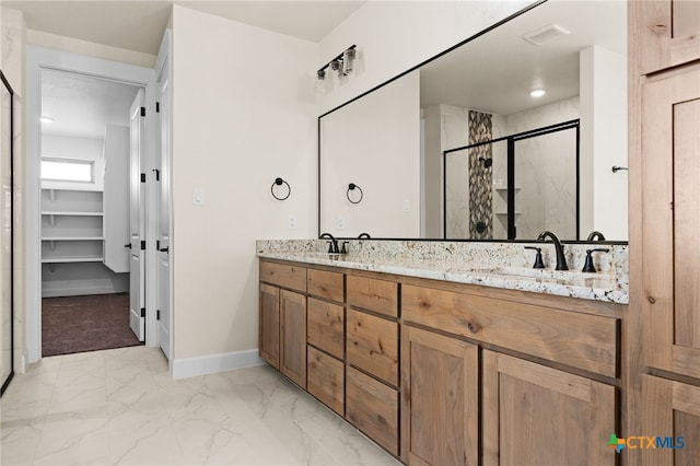 4231 Cold Springs Dr, Copperas Cove, TX 76539 - full bath featuring marble finish floor, visible vents, a sink, baseboards, and a stall shower