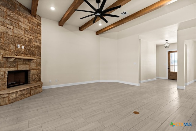 4231 Cold Springs Dr, Copperas Cove, TX 76539 - unfurnished living room featuring a stone fireplace, ceiling fan, baseboards, beam ceiling, and visible vents
