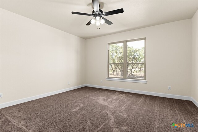 4231 Cold Springs Dr, Copperas Cove, TX 76539 - unfurnished room featuring dark carpet, a ceiling fan, and baseboards
