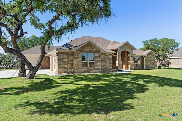 4231 Cold Springs Dr, Copperas Cove, TX 76539 - view of front of house featuring a front lawn, roof with shingles, and a garage