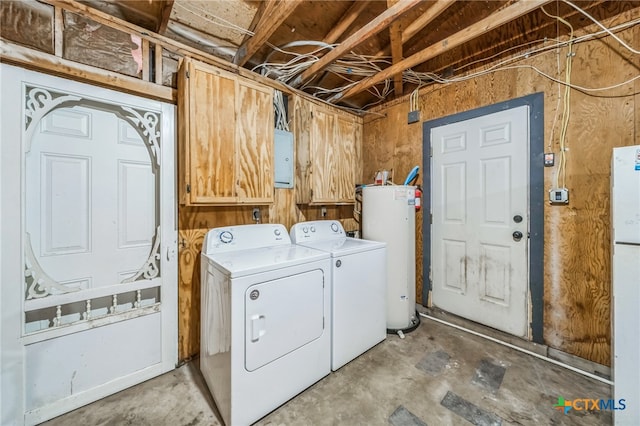 clothes washing area with water heater, electric panel, cabinets, and washer and dryer