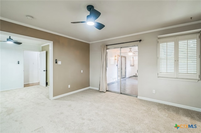 unfurnished bedroom with ceiling fan, light carpet, access to exterior, and crown molding