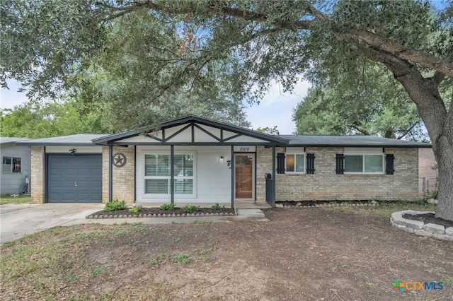 single story home featuring a garage