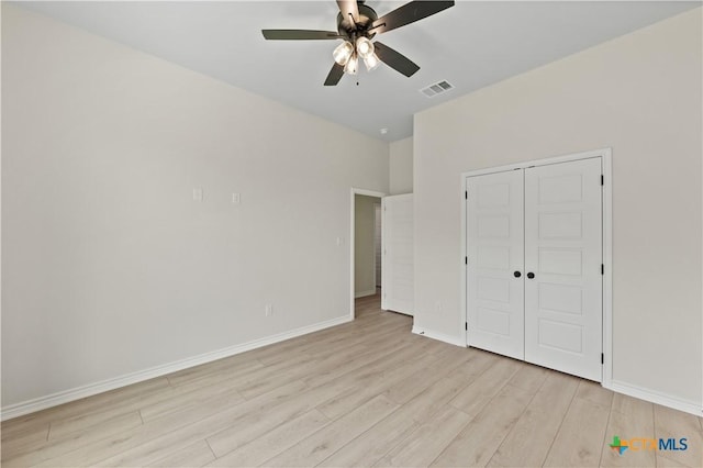 301 Canyon Oaks Rd, Troy, TX 76579 - unfurnished bedroom featuring baseboards, a closet, light wood-style flooring, and visible vents