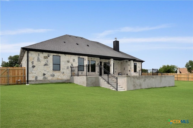 301 Canyon Oaks Rd, Troy, TX 76579 - rear view of property featuring a fenced backyard, a chimney, and a lawn