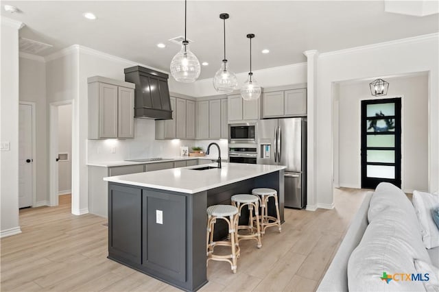 301 Canyon Oaks Rd, Troy, TX 76579 - kitchen featuring a sink, appliances with stainless steel finishes, gray cabinetry, and light countertops