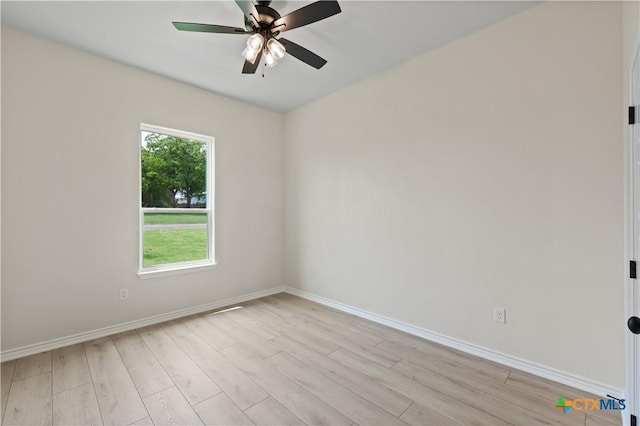 301 Canyon Oaks Rd, Troy, TX 76579 - unfurnished room with baseboards, ceiling fan, and light wood finished floors