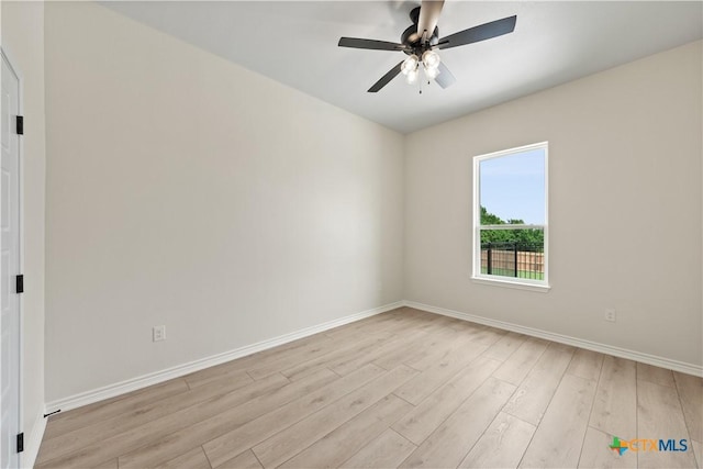 301 Canyon Oaks Rd, Troy, TX 76579 - empty room with baseboards, a ceiling fan, and light wood-style flooring