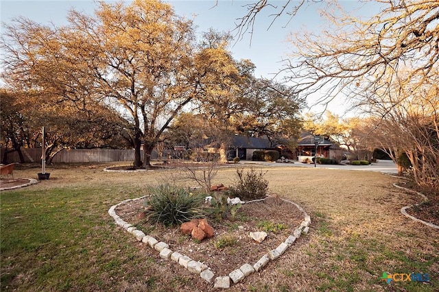 view of yard with fence