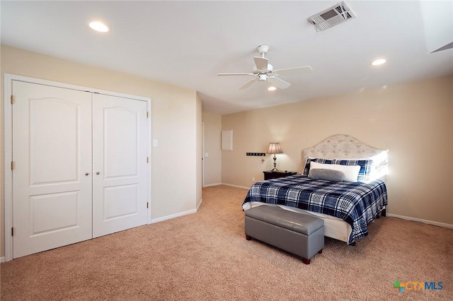 bedroom featuring visible vents, carpet floors, baseboards, recessed lighting, and a closet