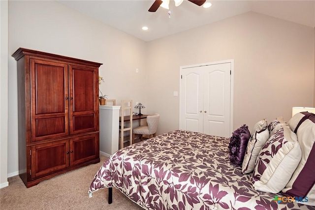 bedroom featuring lofted ceiling, a ceiling fan, baseboards, and light carpet