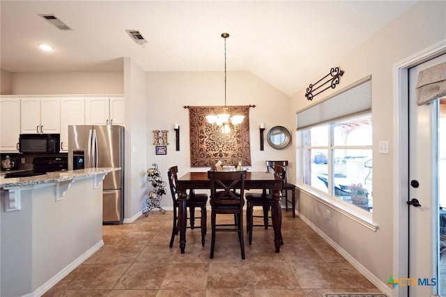 dining room with visible vents, baseboards, an inviting chandelier, and vaulted ceiling