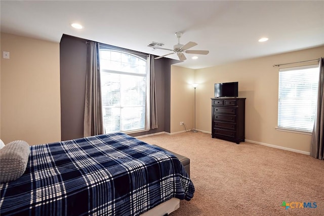 bedroom with recessed lighting, visible vents, baseboards, and light colored carpet