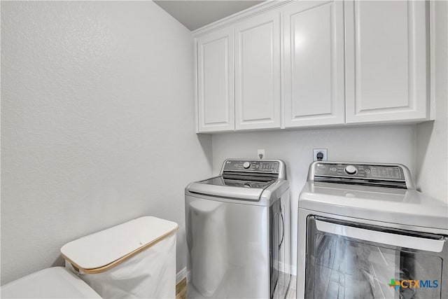 7611 Iridium Dr, Killeen, TX 76542 - laundry area with cabinet space and independent washer and dryer