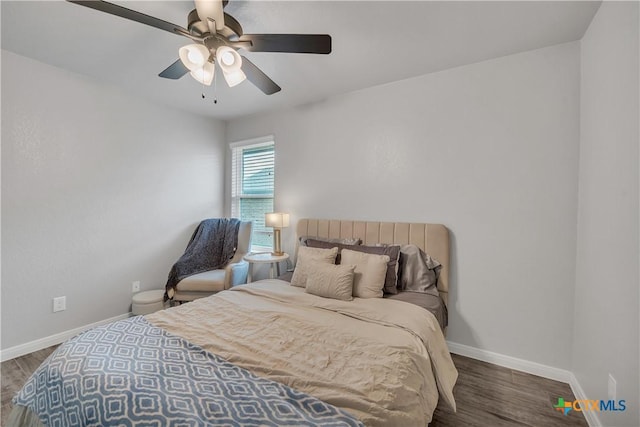 7611 Iridium Dr, Killeen, TX 76542 - bedroom with wood finished floors, baseboards, and a ceiling fan