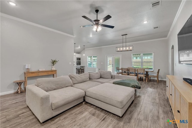 7611 Iridium Dr, Killeen, TX 76542 - living room featuring light wood-style floors, ceiling fan, baseboards, crown molding, and recessed lighting
