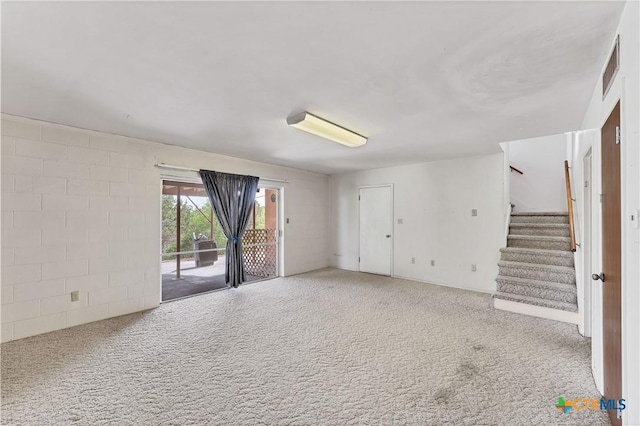667 Fredericksburg Rd, New Braunfels, TX 78130 - carpeted spare room with stairs and visible vents