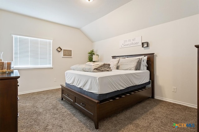 bedroom featuring carpet flooring and vaulted ceiling