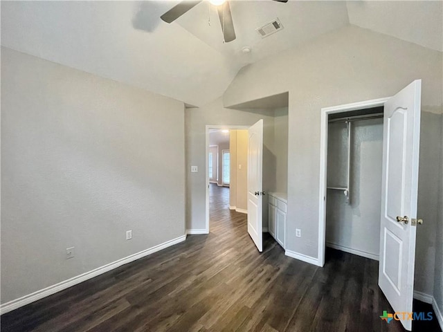 1715 Ramona Cir, San Marcos, TX 78666 - unfurnished bedroom with lofted ceiling, dark wood-style flooring, a ceiling fan, and a closet