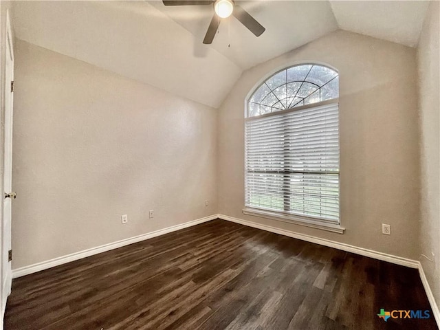 1715 Ramona Cir, San Marcos, TX 78666 - spare room with ceiling fan, dark wood-style flooring, and lofted ceiling