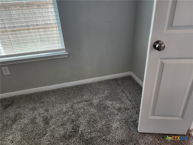 empty room featuring carpet floors