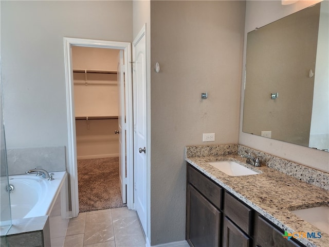 bathroom with a bathtub and vanity