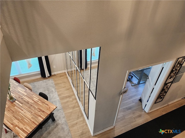 staircase featuring hardwood / wood-style floors