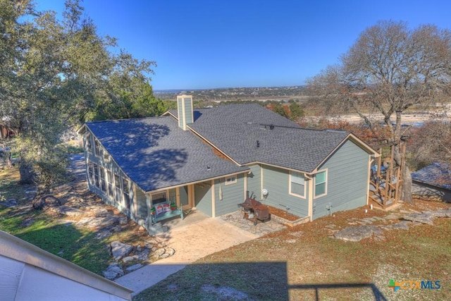 view of front of property featuring a patio area