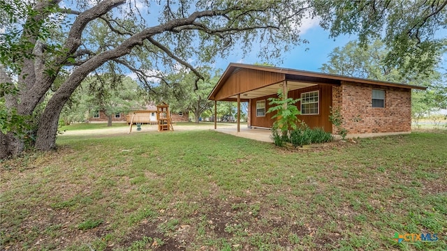 view of yard featuring a wooden deck