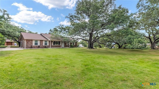 view of yard featuring a garage