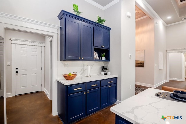 kitchen featuring blue cabinetry, ornamental molding, light stone countertops, and decorative backsplash