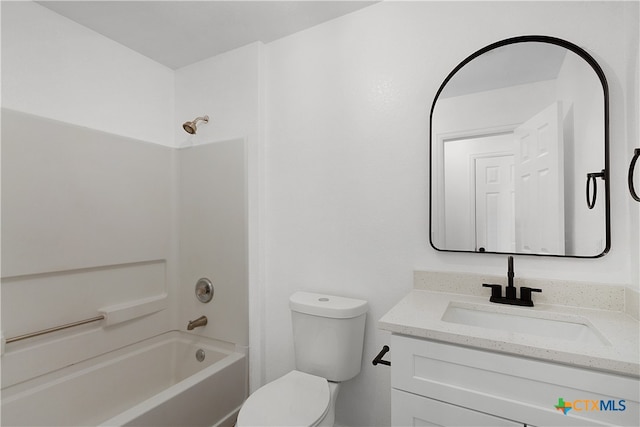 full bathroom featuring vanity, toilet, and  shower combination