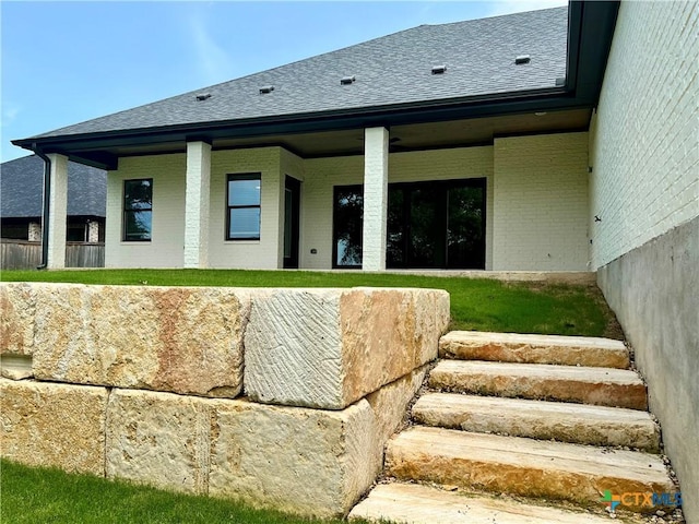 2819 Isaac Cir, Belton, TX 76513 - rear view of property with brick siding and roof with shingles