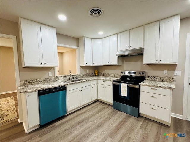 kitchen featuring white cabinetry, light hardwood / wood-style floors, appliances with stainless steel finishes, light stone countertops, and sink