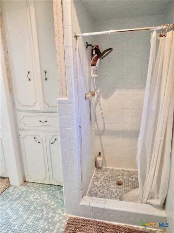 4410 Fm 1115, Flatonia, TX 78959 - bathroom with a stall shower and tile patterned flooring