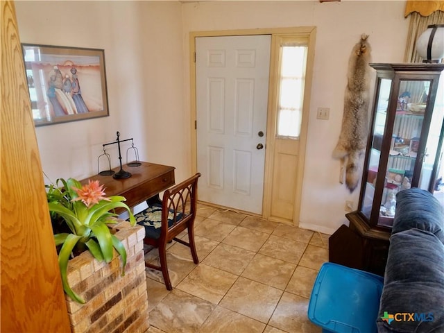 4410 Fm 1115, Flatonia, TX 78959 - foyer with light tile patterned flooring and baseboards