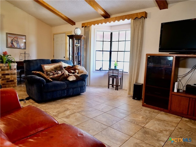 living room featuring light tile patterned flooring, a textured ceiling, and vaulted ceiling with beams