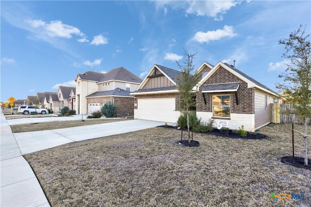 view of front of home with brick siding, board and batten siding, a garage, a residential view, and driveway