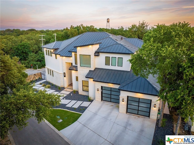 modern farmhouse with a garage