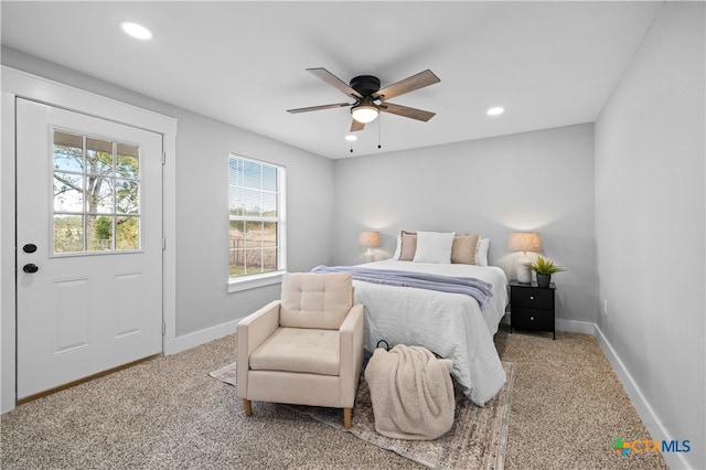 bedroom featuring ceiling fan and carpet flooring