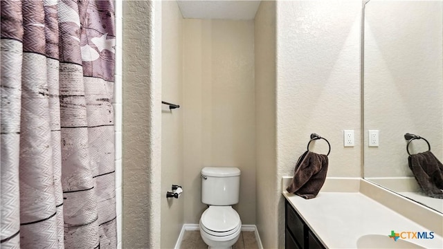 957/959 Floating Star, New Braunfels, TX 78130 - bathroom featuring vanity, a textured wall, tile patterned floors, and curtained shower