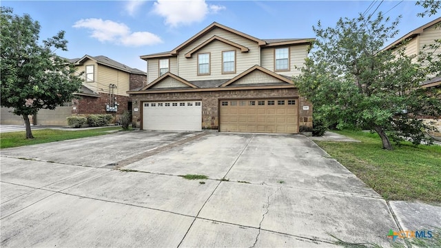 957/959 Floating Star, New Braunfels, TX 78130 - view of front of house with driveway, an attached garage, and a front lawn