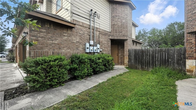957/959 Floating Star, New Braunfels, TX 78130 - view of side of property featuring brick siding