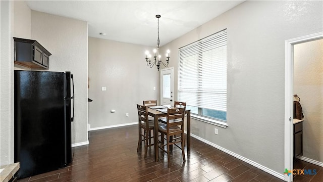 957/959 Floating Star, New Braunfels, TX 78130 - dining space featuring a chandelier and dark wood-type flooring