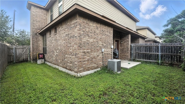 957/959 Floating Star, New Braunfels, TX 78130 - view of home's exterior featuring brick siding and a fenced backyard