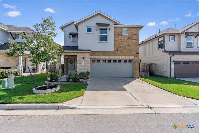 view of front of home with a garage and a front yard