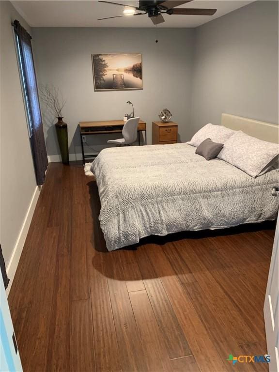 164 Buck Ln, Belton, TX 76513 - bedroom with wood finished floors, ceiling fan, and baseboards